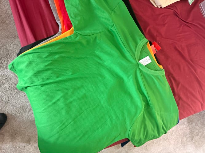 Lot of 13 Practice Hockey Jerseys - Youth L/XL
