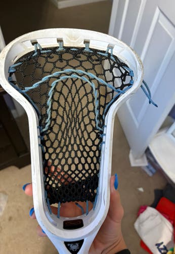 ECD infinity pro white womens lacrosse head with black mesh and Carolina blue shooters