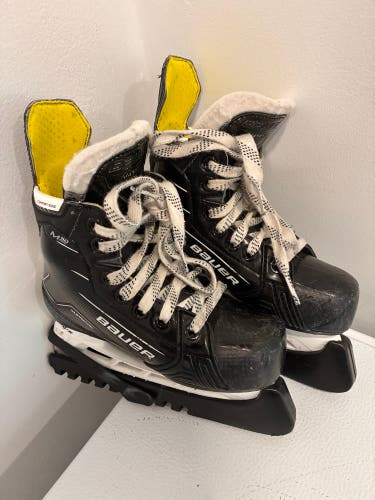 Black/White 2024 Bauer Supreme M50 Pro Hockey Skates Regular Width 12 (Used)