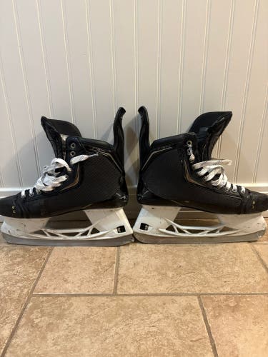 Black 2025 CCM JetSpeed FT8 Pro Hockey Skates Regular Width Pro Stock 9 (Used) with shot blockers