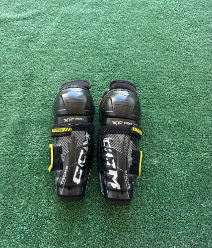 Youth CCM Tacks XF Pro Shin Pads 8" (Used)
