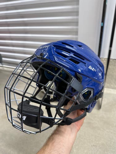 Large Bauer Re-Akt 150 + Oreo Cage Helmet (Used)