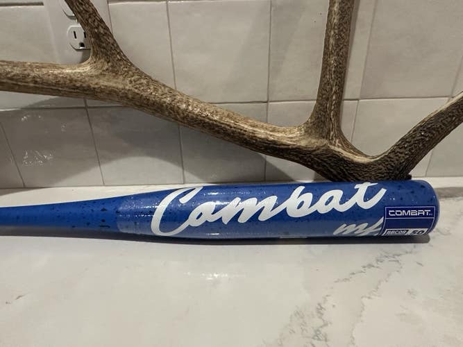 NIW Combat Spec A1 Cookie Monster 34/31 (-3) BBCOR Baseball Bat