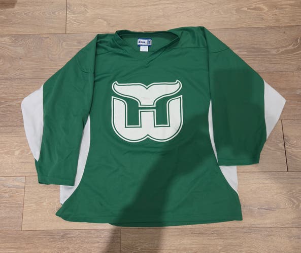 Used Team set of 14 Whalers Hockey Jerseys