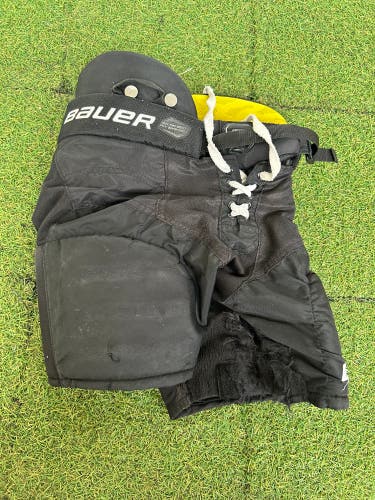 Black Youth Medium Bauer Supreme Ultrasonic Hockey Pants (Used)