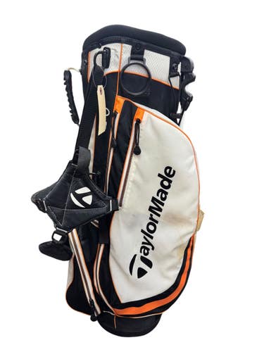 USED TAYLORMADE 4 WAY STAND BAG BLACK AND ORANGE 11835-S000213113