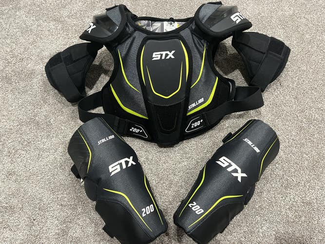 Youth Medium STX Lacrosse Chest and Shoulder Protector and arm Guards.  NO GLOVES.(Used)