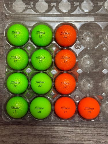 13 Titleist Velocity Golf Balls - Green and Orange Colors - 5A Condition