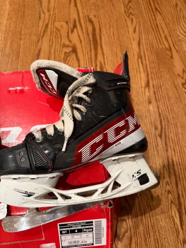 Black/White CCM JetSpeed FT4 Hockey Skates Regular Width Size 4 (Used)
