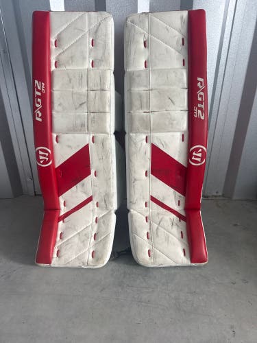 Red & White Junior Warrior GT2 Goalie Leg Pads (Used) | 28”+1”