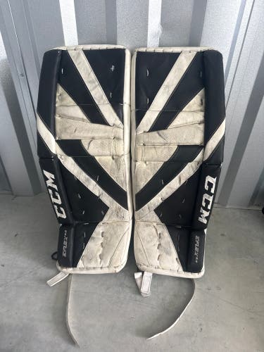 White & Black Intermediate CCM Extreme Flex 5.9 Goalie Leg Pads (Used) | 32”+ 1”