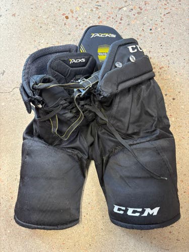 Black Junior Medium CCM Super Tacks Hockey Pants (Used)