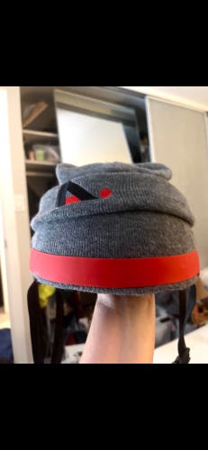 A2 Anti ordinary Beanie snow board helmet Grey removable beanie with hard black and red shell skiing