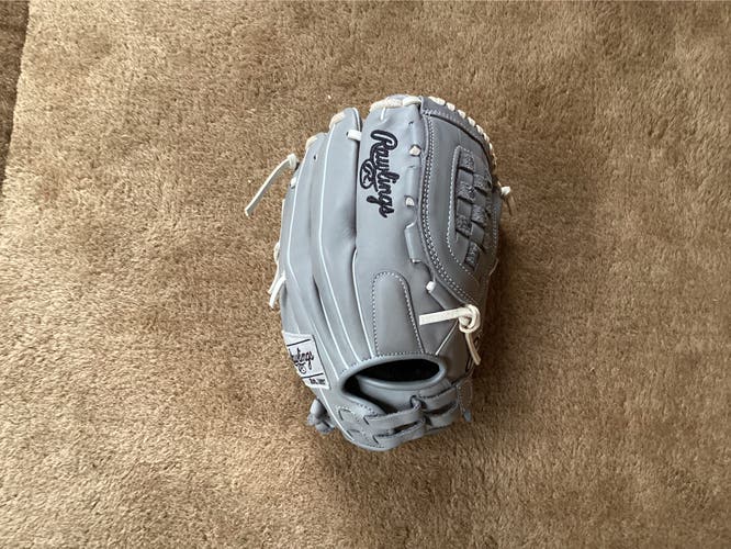 Like New Rawlings Gg elite RH Softball Glove 12"; can break-in upon request