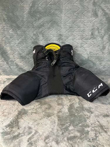 Black Youth Medium CCM AS1 Hockey Pants (Used)
