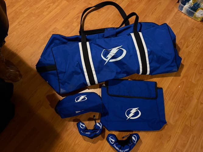 TBL goalie bag, skate soakers, skate bag, and toiletry bag
