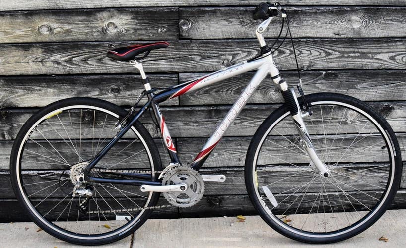 TREK 7300 HYBRID BIKE SIZE M/L, 17.5",  24 SPEED, ALUM, FRONT SUSPENSION