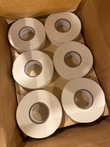 24 rolls of white stick tape. Normal width. Came in a team order from Hockey Monkey. (New)