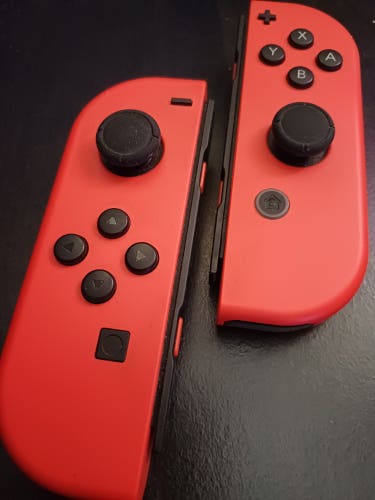 Nintendo Switch 1 OLED Mario Red Joycons