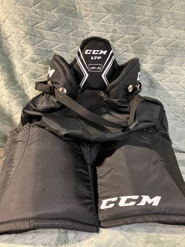 Black Junior Medium CCM LTP Hockey Pants (Used)