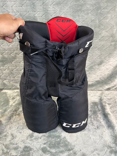 Black Youth Medium CCM QuickLite 230 Hockey Pants (Used)
