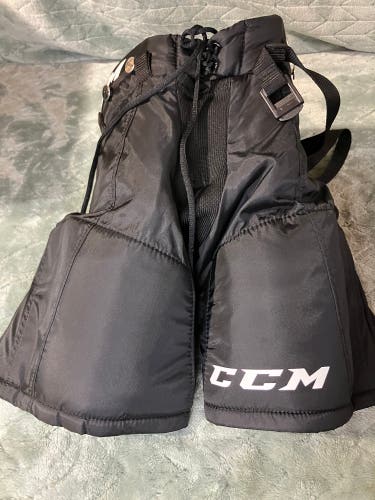 Black Youth Medium CCM QuickLite 230 Hockey Pants (Used)