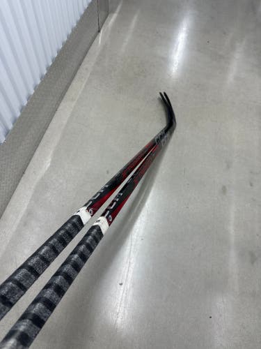 Two Pack Blackhawks / Sabres Senior CCM JetSpeed FT7 Pro Left Hand Hockey Stick 125 flex Pro Stock