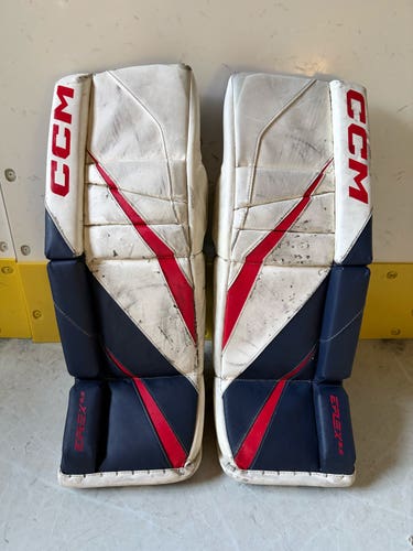 CCM eFlex E5 Junior Goalie Leg Pads – 26+1 – White/Navy/Red
