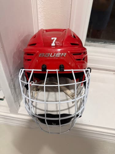 Red hockey helmet