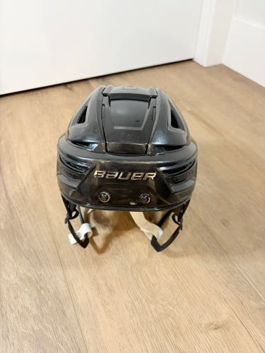 Small Bauer Re-Akt 150 black Helmet adjustable (Used)