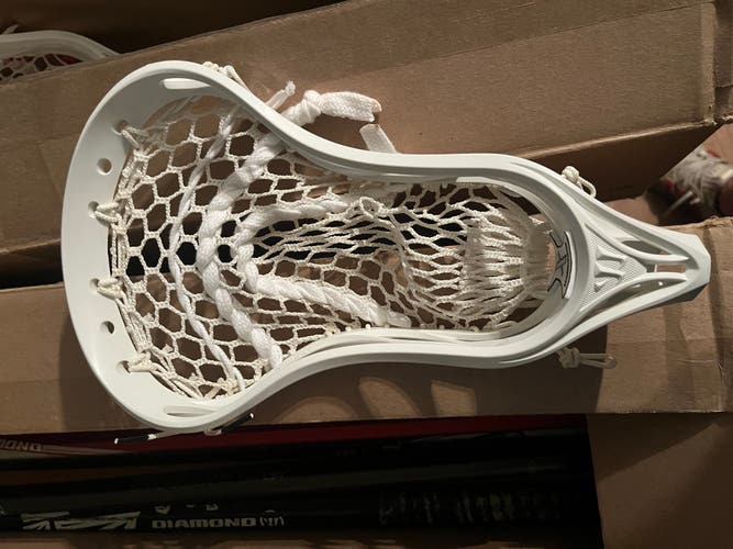 Warrior Burn X lacrosse head w/ ECD Hero strings