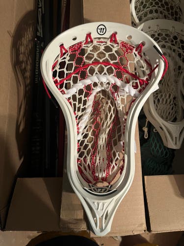 Warrior Burn X lacrosse head w/ ECD Hero strings