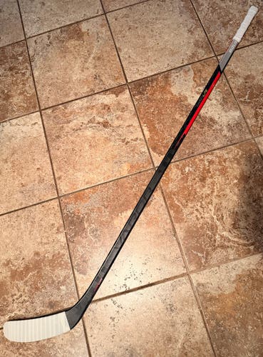 Senior Bauer Vapor Hyperlite Left Hand Hockey Stick 77 Flex Pro Stock (Used)