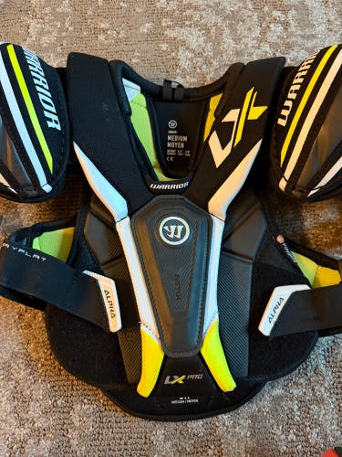 Medium Junior Warrior ALPHA LX PRO Shoulder Pads (Used)