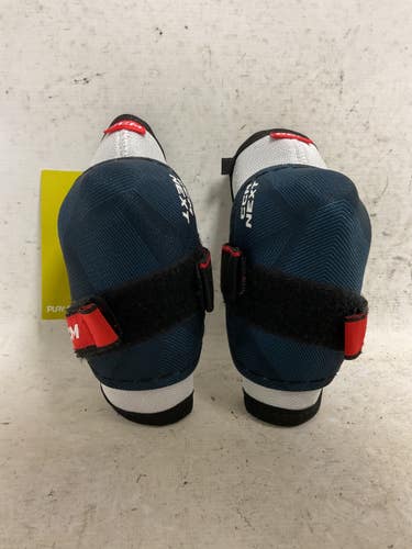 Used CCM NEXT Youth Elbow Pads White/Red/Navy MD 11855-S000212110