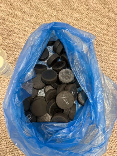 Bag of 30-40 used pucks