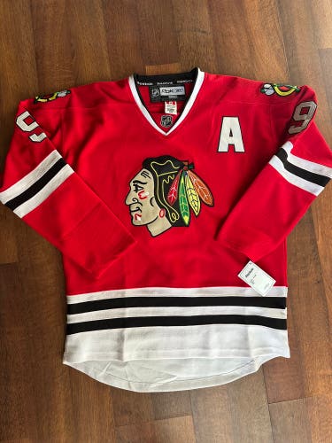NWT Chicago Blackhawks Hull #9 size 50 Men's Reebok Jersey w/fighting strap