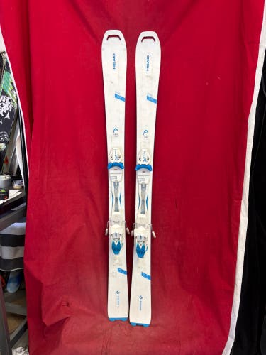 Skis: Head Total Joy women's all-mountain skis, 148cm
Bindings: Head ( grip walk)